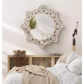 Miroir en bois sculpté