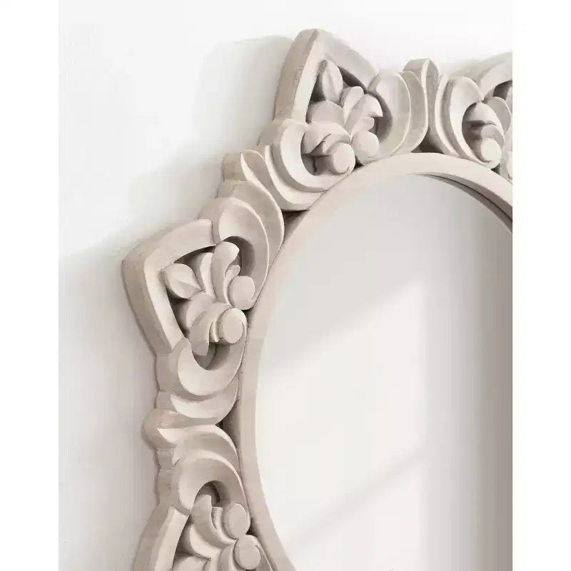 Miroir en bois sculpté