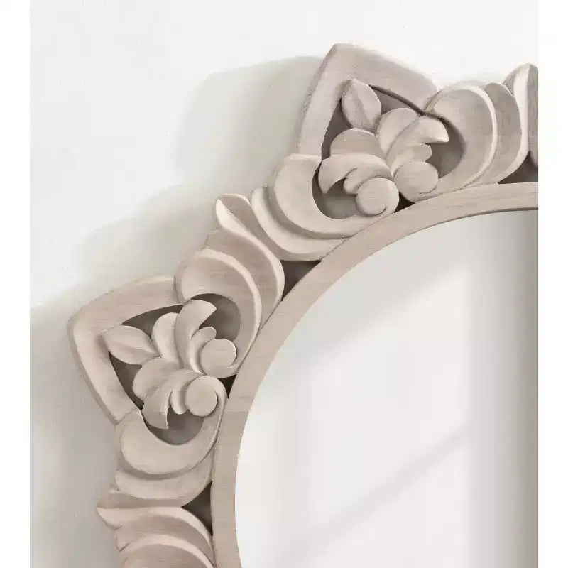 Miroir en bois sculpté